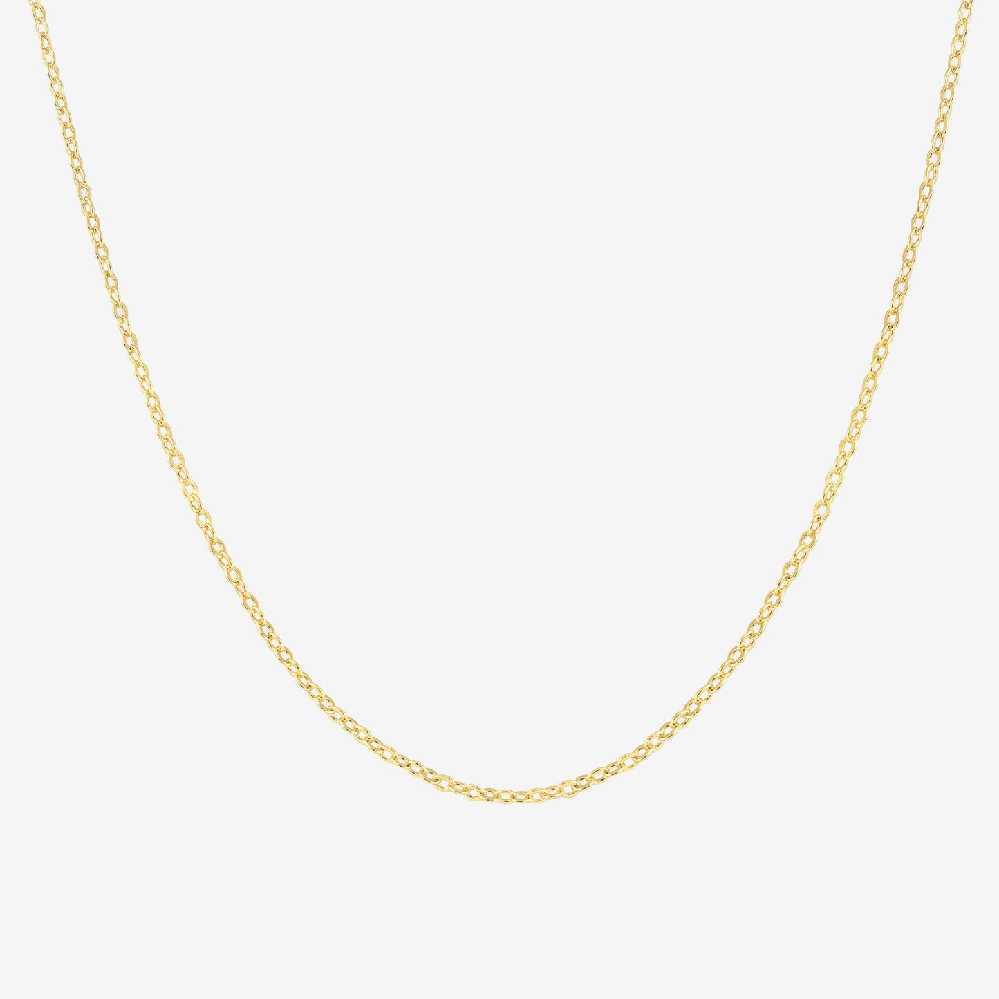 Studio shot of a 18k yellow gold chain necklace with fine cable links, displayed against a light grey background