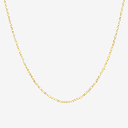 Studio shot of a 18k yellow gold chain necklace with fine cable links, displayed against a light grey background