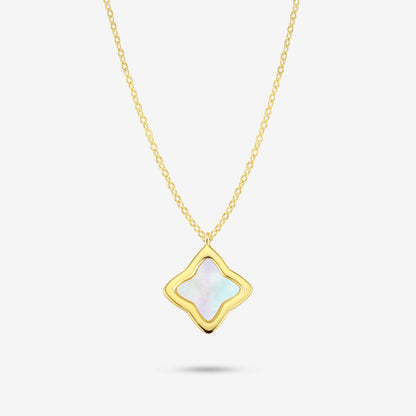 Studio shot of the Gold Creia Necklace with a flower-shaped pendant and iridescent mother-of-pearl inlay on a grey background
