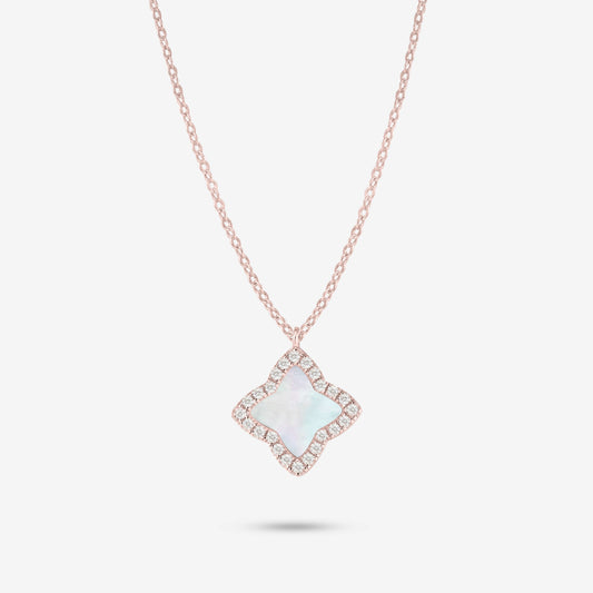 Studio shot of the Rose Gold Edea Necklace displaying a four-petal flower pendant highlighted by a mother-of-pearl center and moissanite border against light grey background