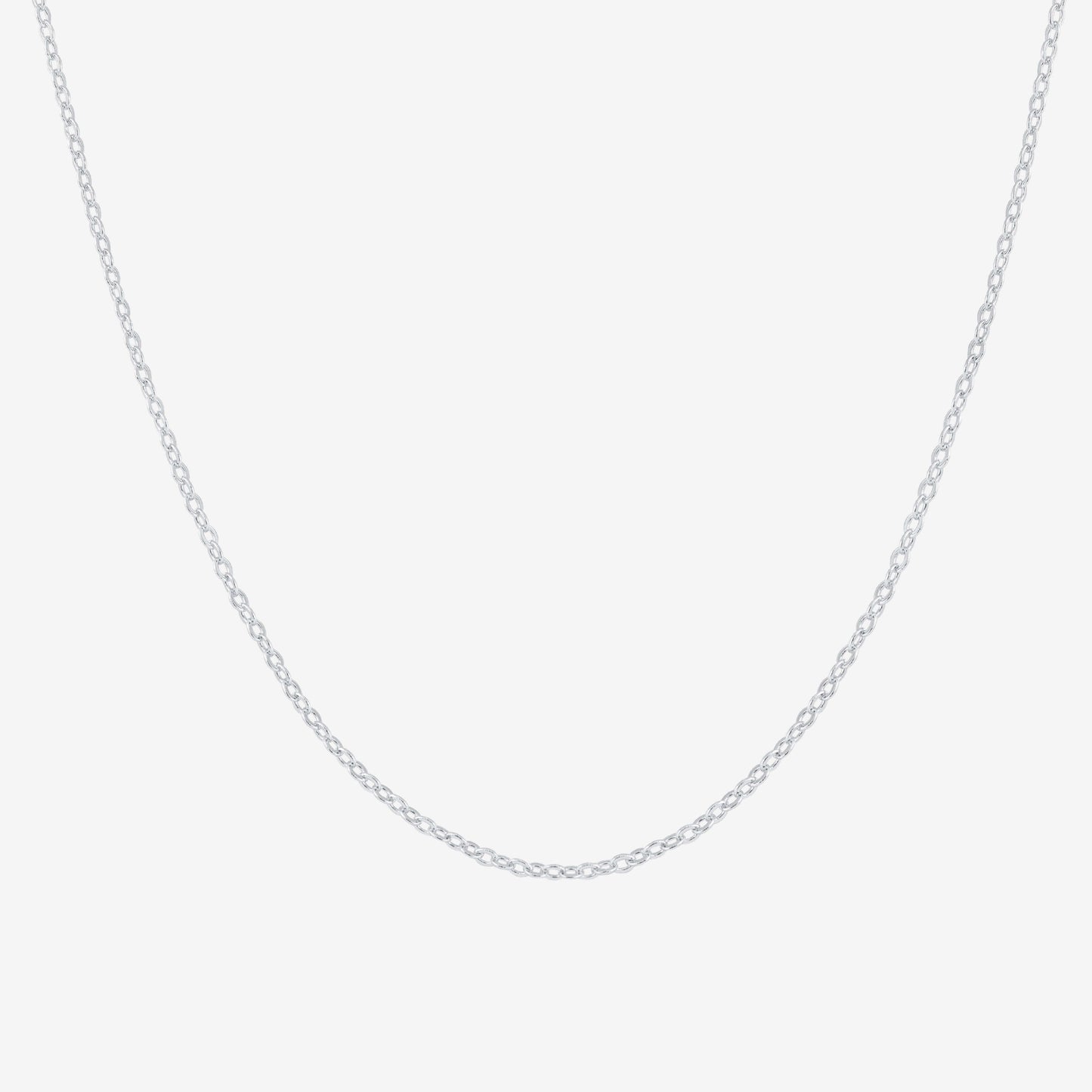 Studio shot of a sleek 925 silver chain necklace with delicate cable links, presented on a pale grey background